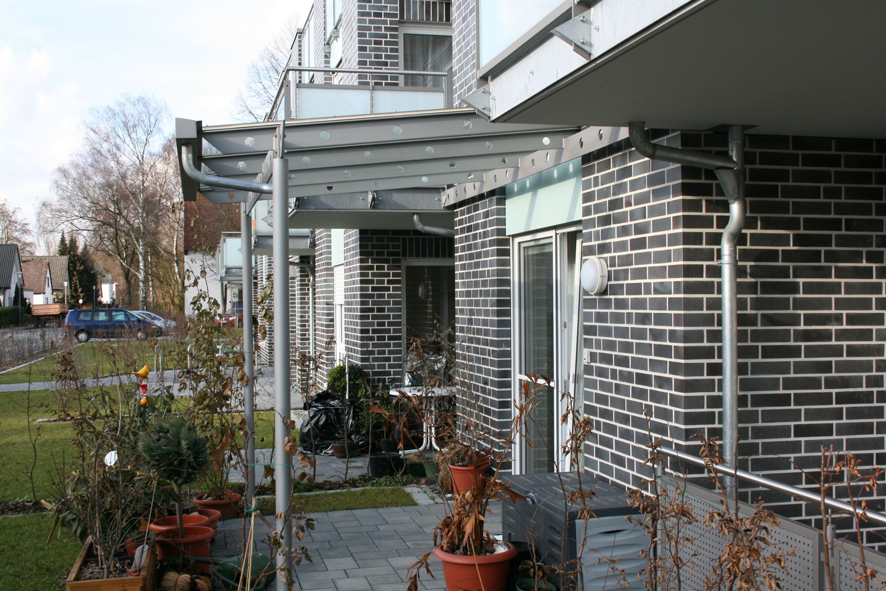 Terrassenüberdachung aus Stahl und Glas